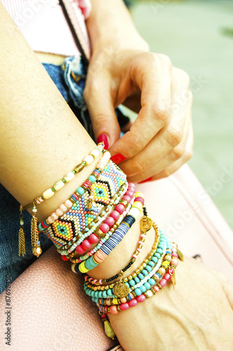 Stylish bracelets on female hand