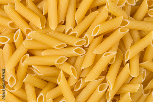 dried penne pasta background