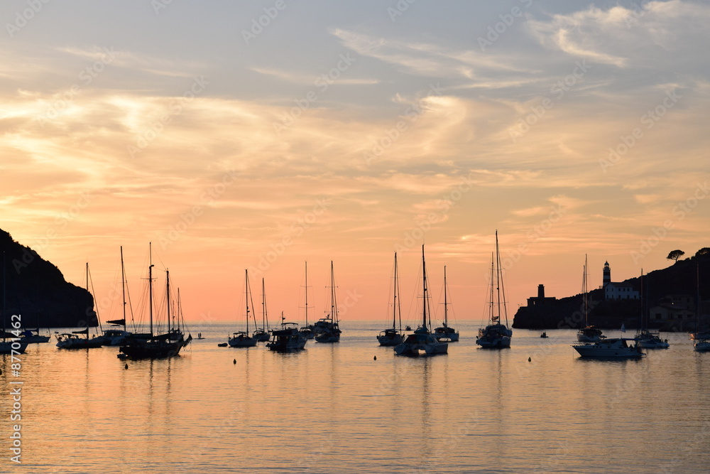 Sunset over natural harbor of Port de Soller on Majorca