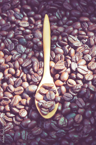Coffee beans and wooden spoon with filter effect retro vintage s