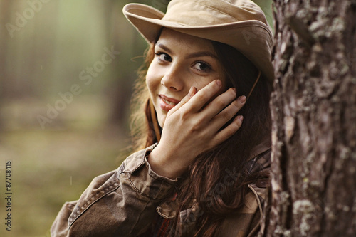 Billede på lærred Young girl in the forest ranger