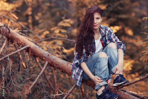 beautiful girl traveling in the woods