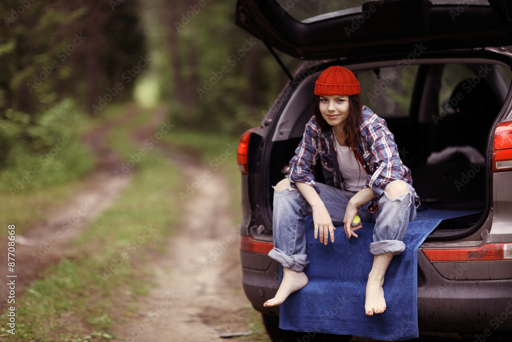 Fototapeta premium Young girl in the forest ranger