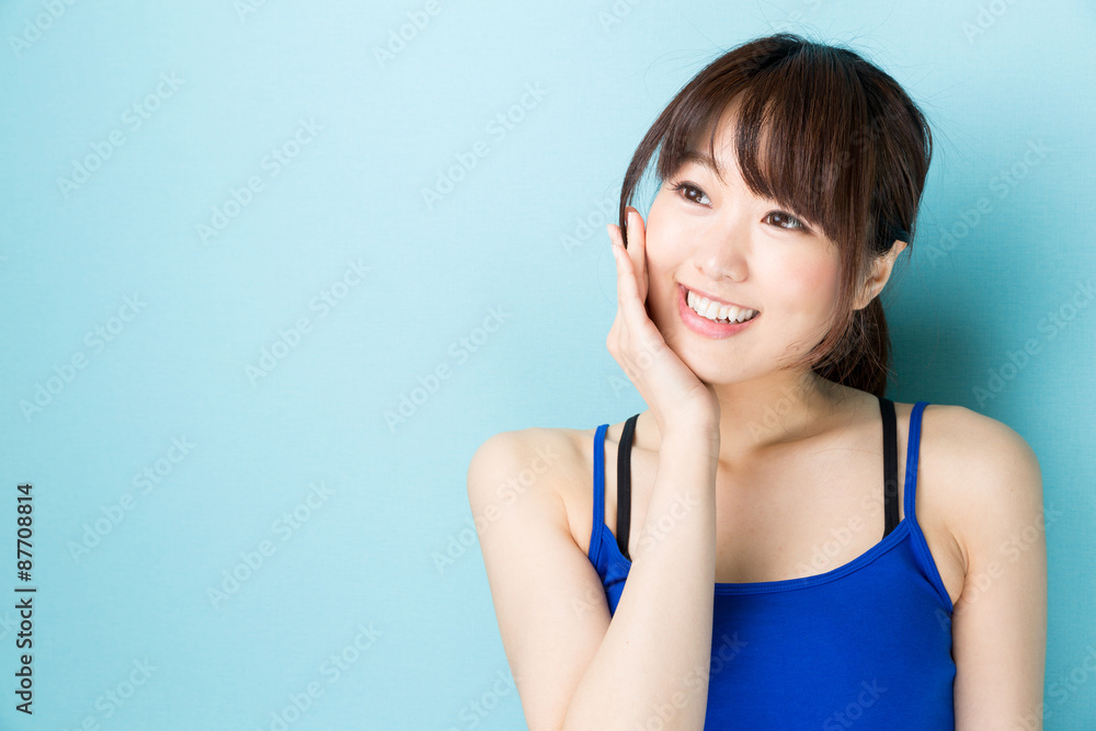 attractive asian woman beauty image on blue background attractive asian woman beauty image on blue background