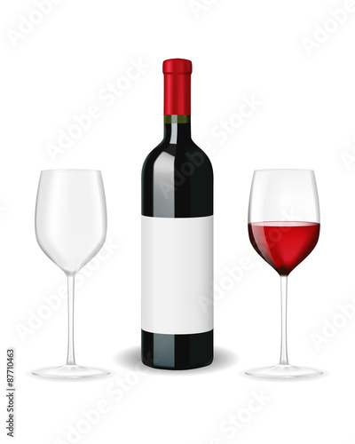 Bottle of red wine with two glasses and blank lable