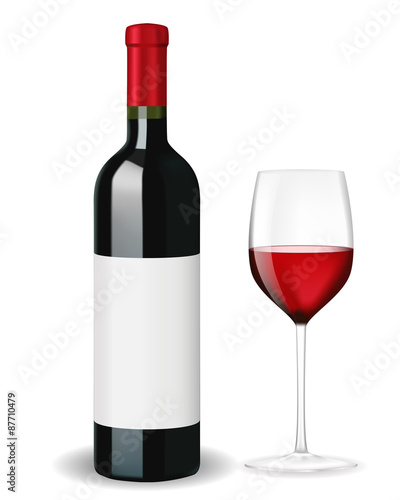 Bottle of red wine with glass and blank lable