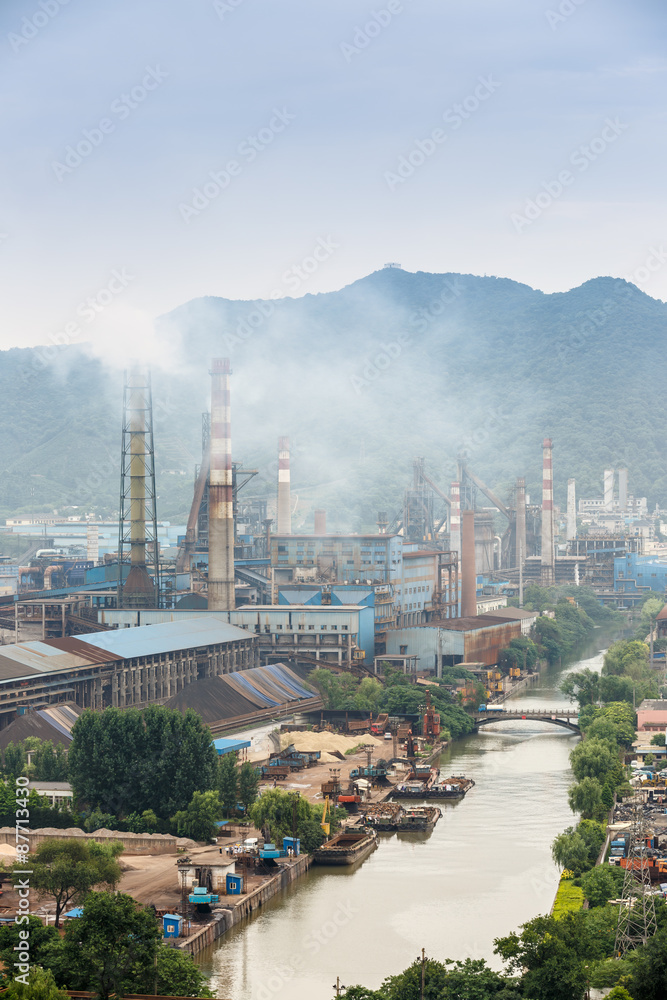 Steel mills hazy smoke pollution in industrial area