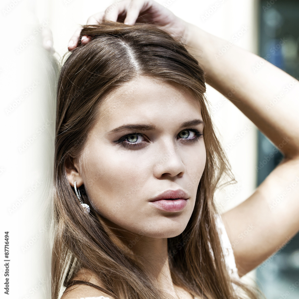 Fototapeta premium Close up portrait of a beautiful young girl