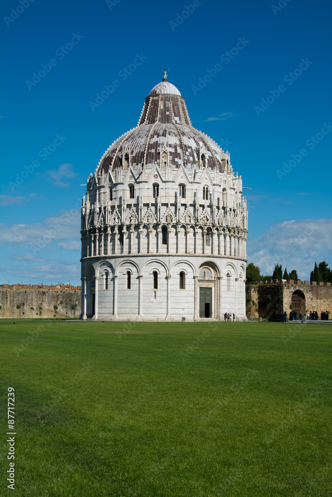 green lawn in front of Pisa baptistery  , Tuscany,  Italy