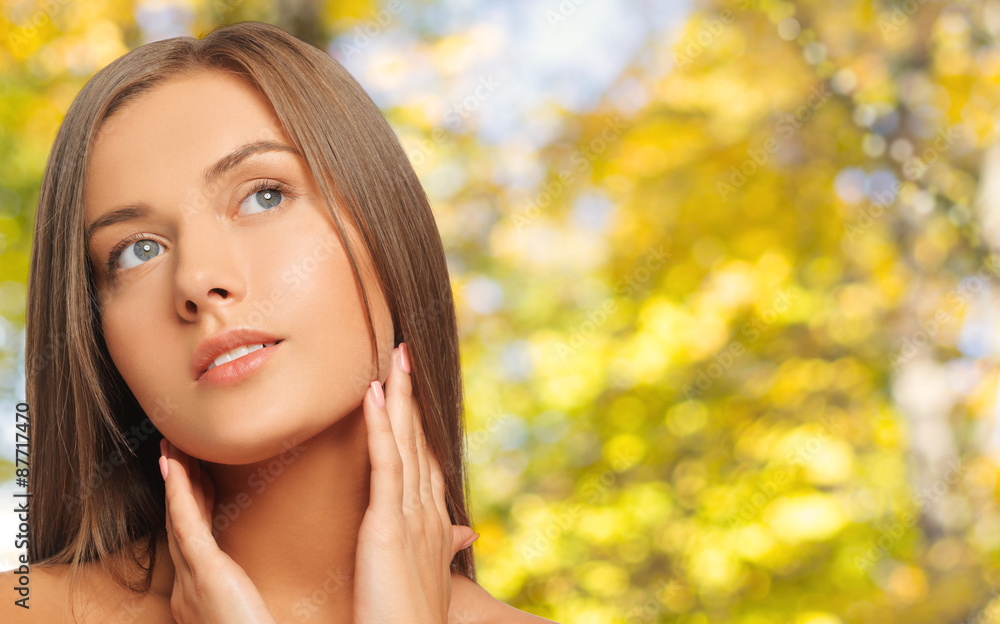 beautiful young woman touching her neck beautiful young woman touching her neck