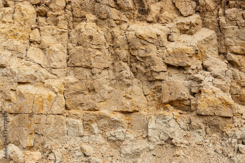 Wall of sand in sand pit close-up