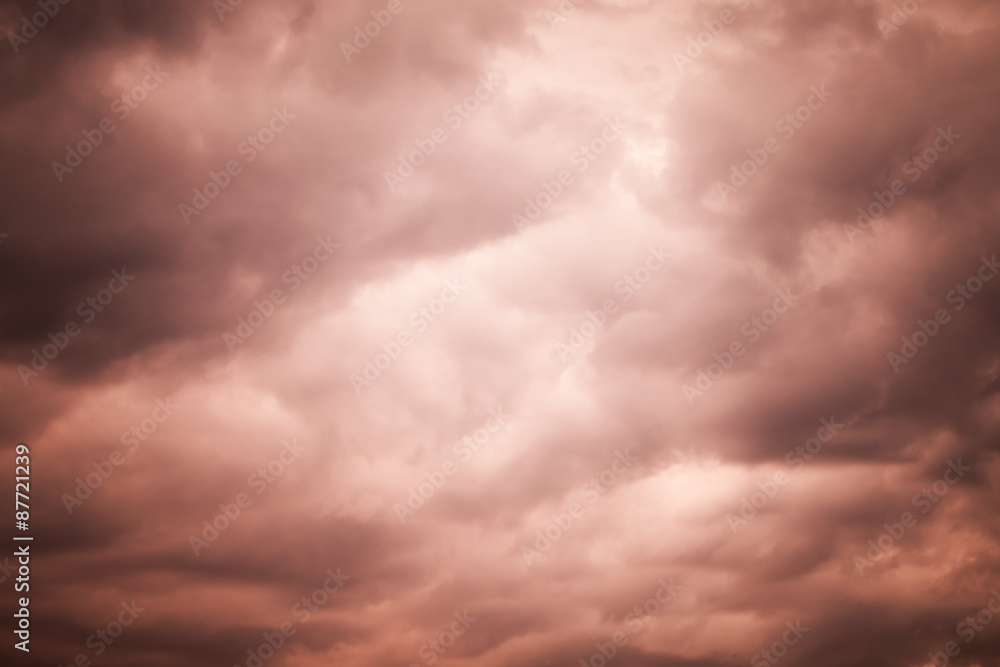 Dark red moody stormy clouds, natural sky background