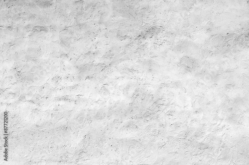 Empty white concrete wall with plaster relief pattern