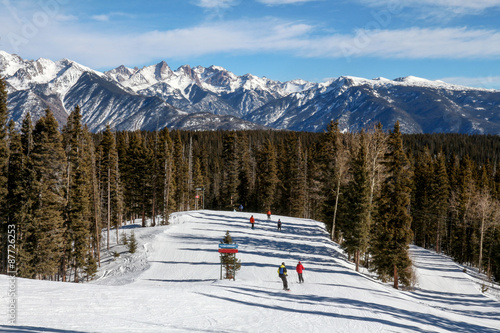 Skiers going down a ski run at Purgatory in Durango, Colorado