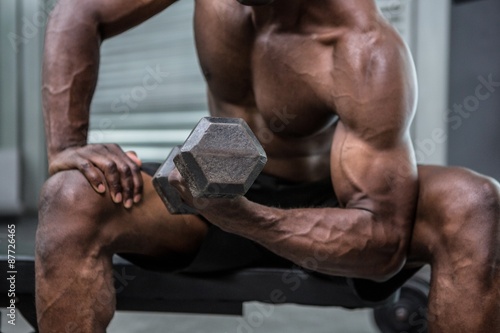 Young Bodybuilder doing weightlifting 