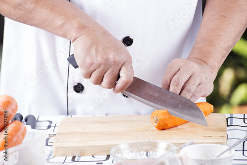 Chef is cutting carrots