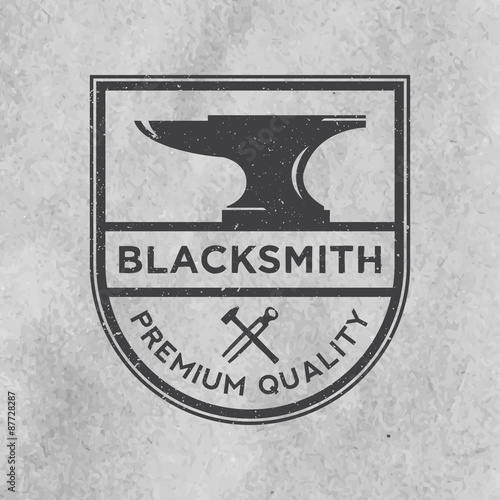 blacksmith emblem with grunge texture on old paper background