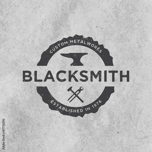 blacksmith emblem with grunge texture on old paper background