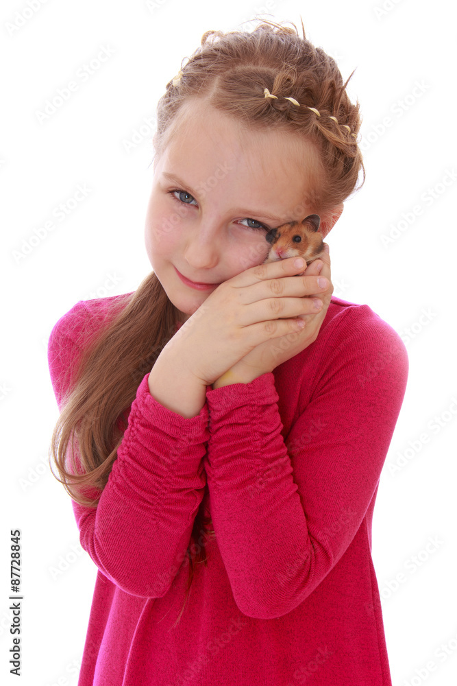Girl holding a hamster