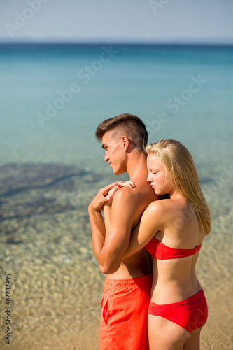 Young couple relaxing on the beach