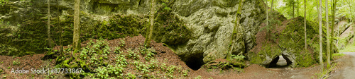 rock formation with a cave passage panorama