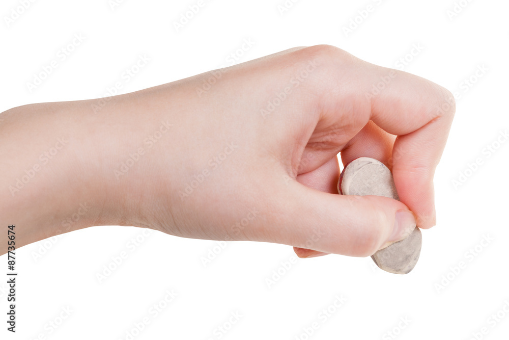 hand with white rubber eraser close up isolated hand with white rubber eraser close up isolated