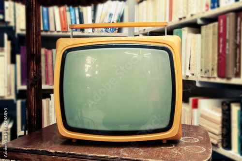 Retro TV set in vintage setting - old living room