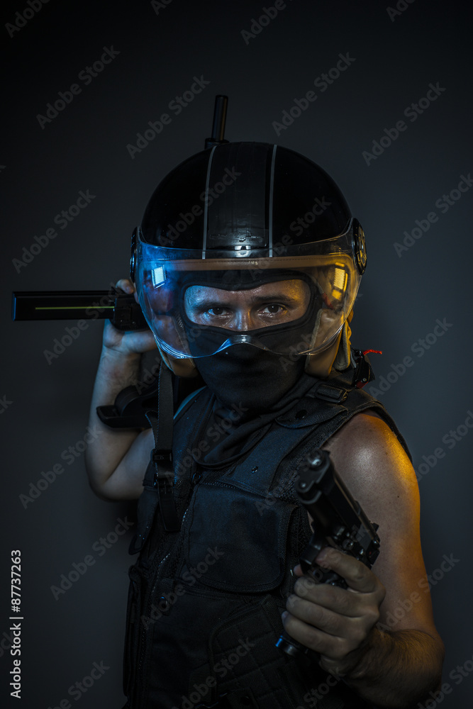 murderer with motorcycle helmet and guns
