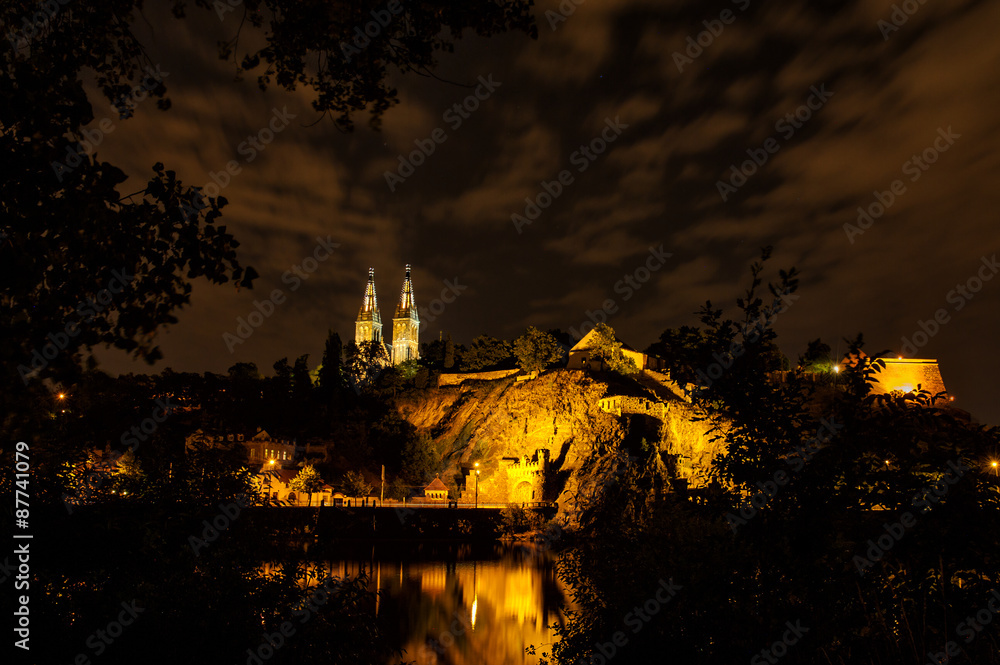 Vysehrad from river side with Basilica towers in the night, Czech Republic