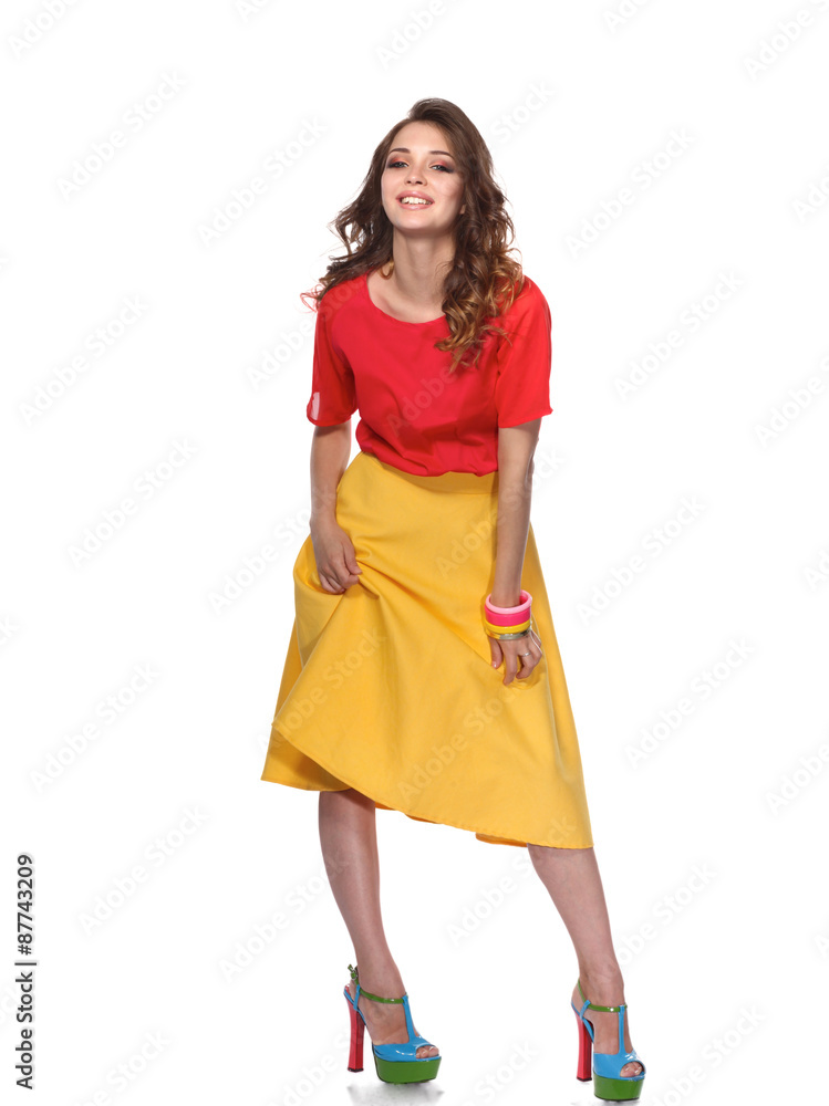 Beautiful woman with curly hair wearing a red jacket, isolated Beautiful woman with curly hair wearing a red jacket, isolated