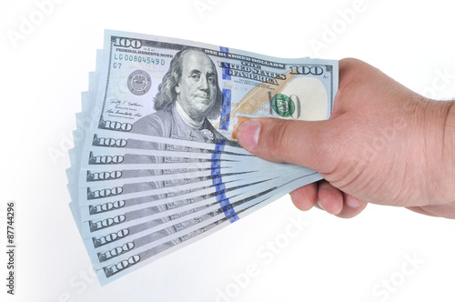 Hands holding dollar cash
