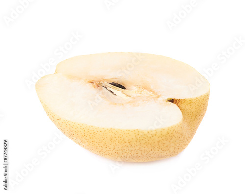 Yellow pear cut in half isolated