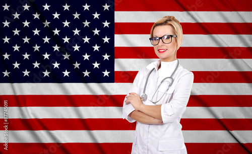 female doctor and usa flag