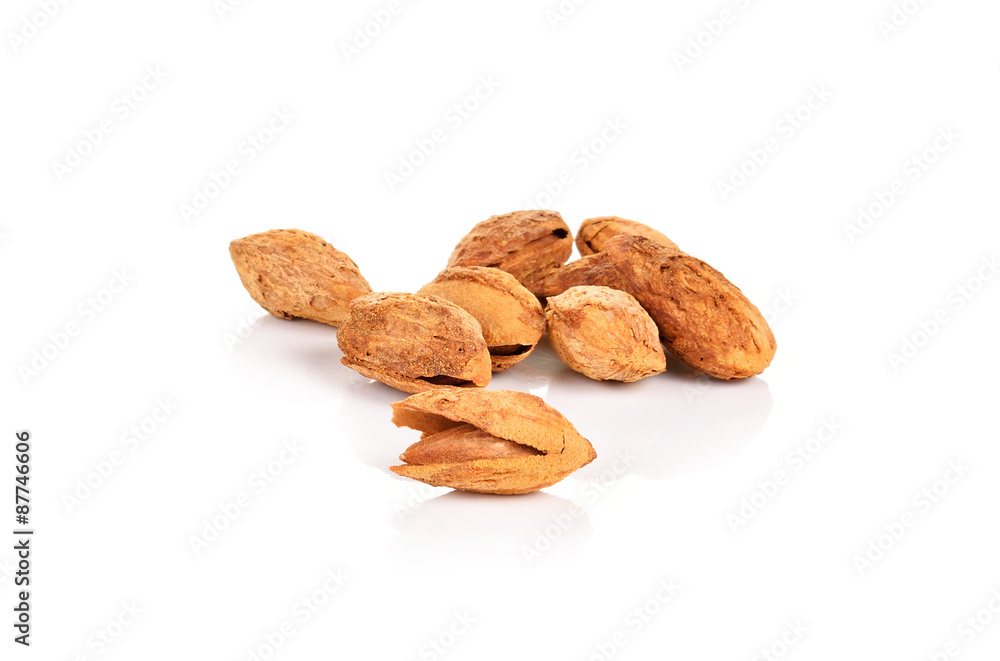 Dried almonds isolated on a white background Dried almonds isolated on a white background