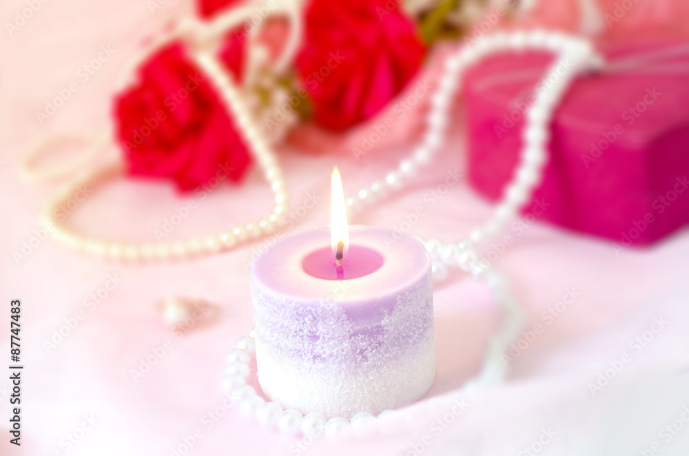 Romantic background - Aroma candle with red rose bouquet and pea Romantic background - Aroma candle with red rose bouquet and pea