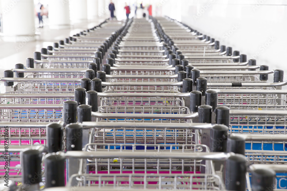 Obraz premium trolleys luggage in a row in airport