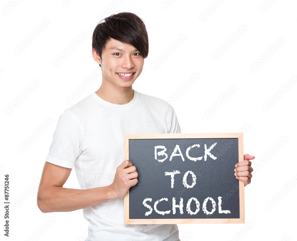 Young university student with blackboard showing phrases of back Young university student with blackboard showing phrases of back