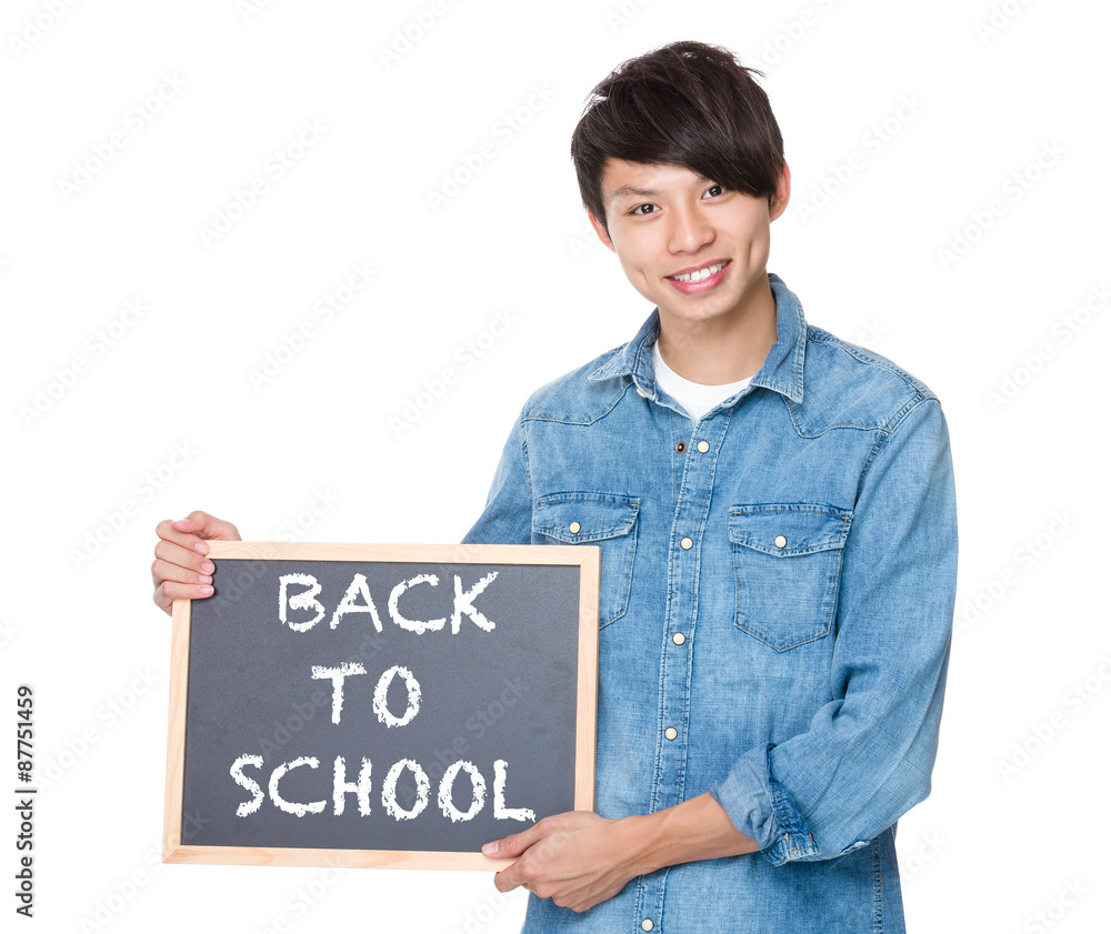 Man hold with blackboard showing phrases of back to school Man hold with blackboard showing phrases of back to school