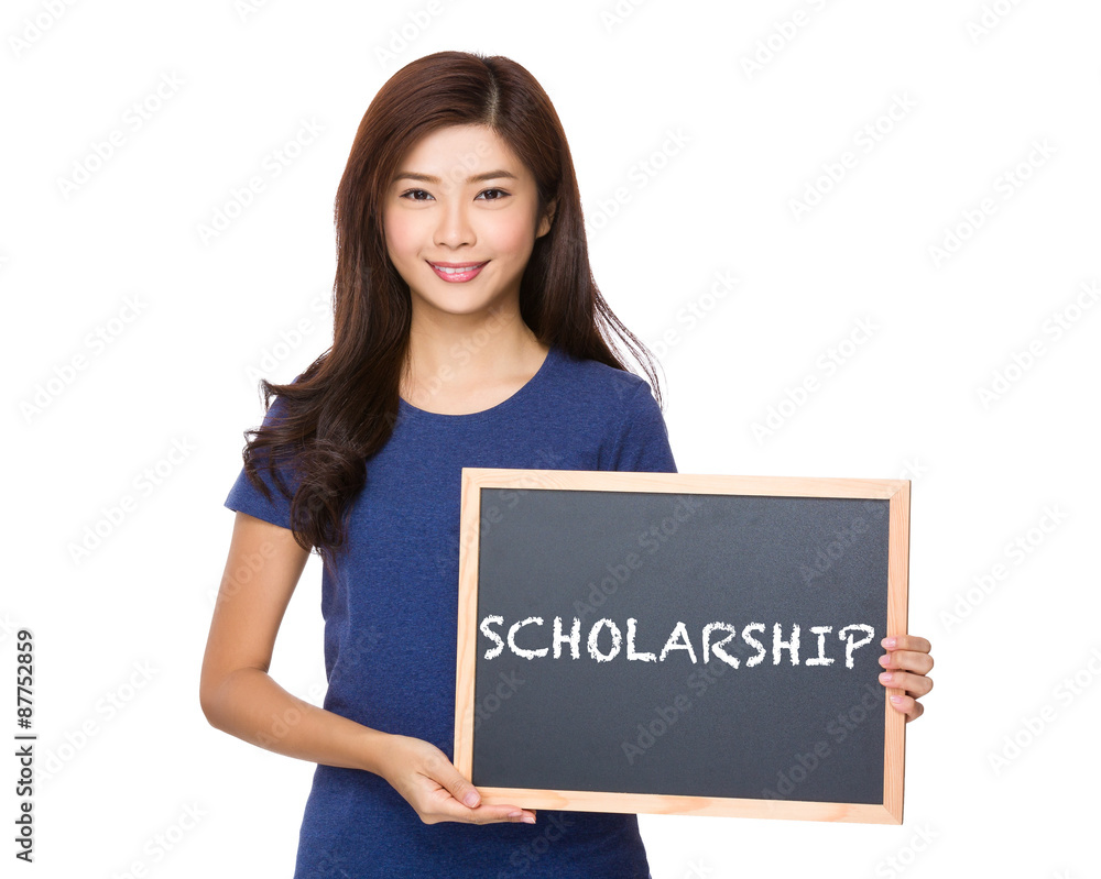 Asian woman with blackboard showing a word of scholarship Asian woman with blackboard showing a word of scholarship
