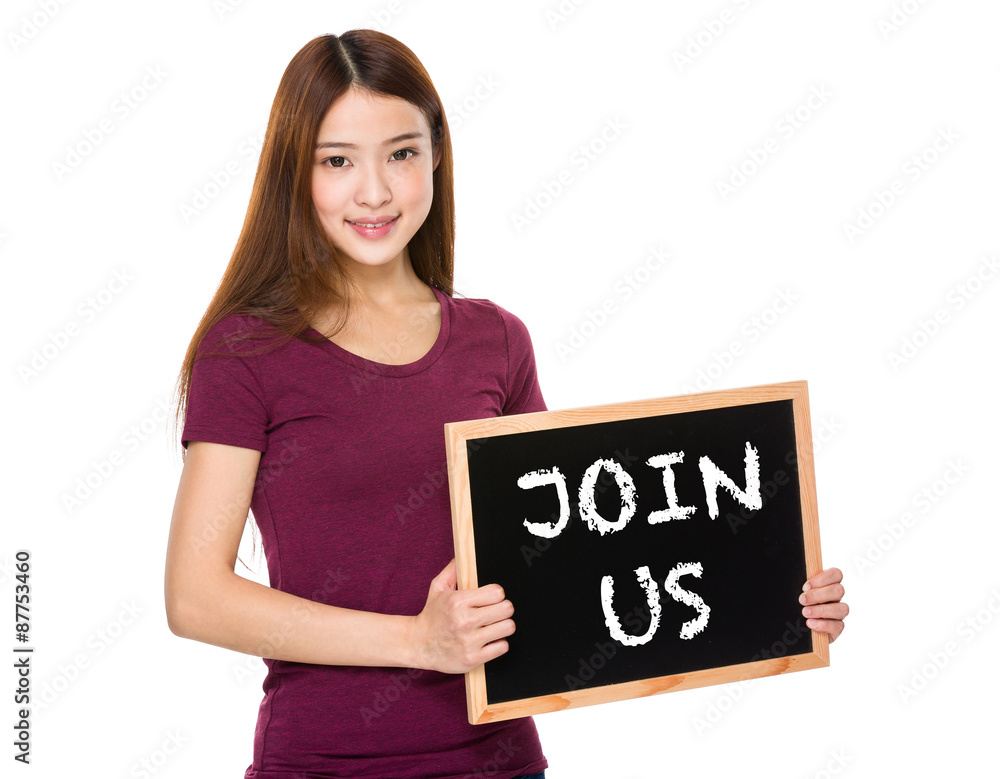 Young student hold with chalkboard showing phrase of join us Young student hold with chalkboard showing phrase of join us