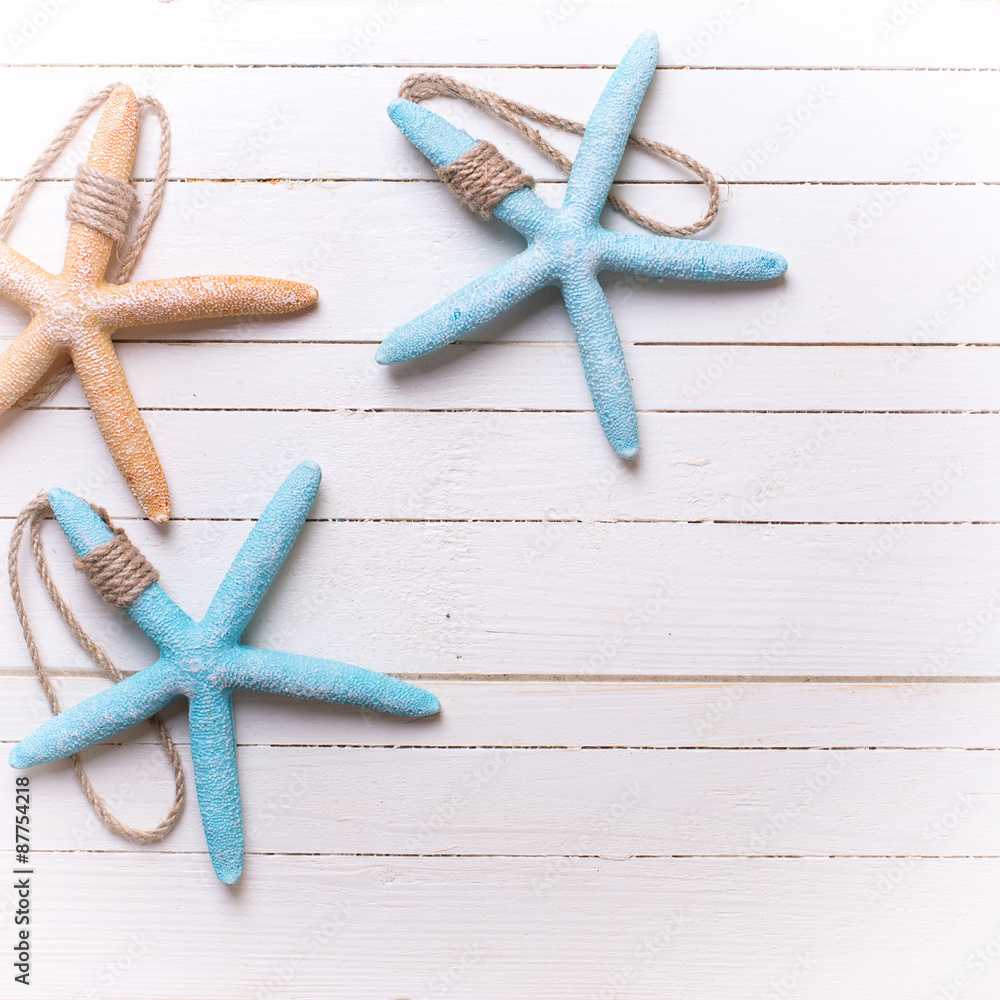 Marine items on wooden background.