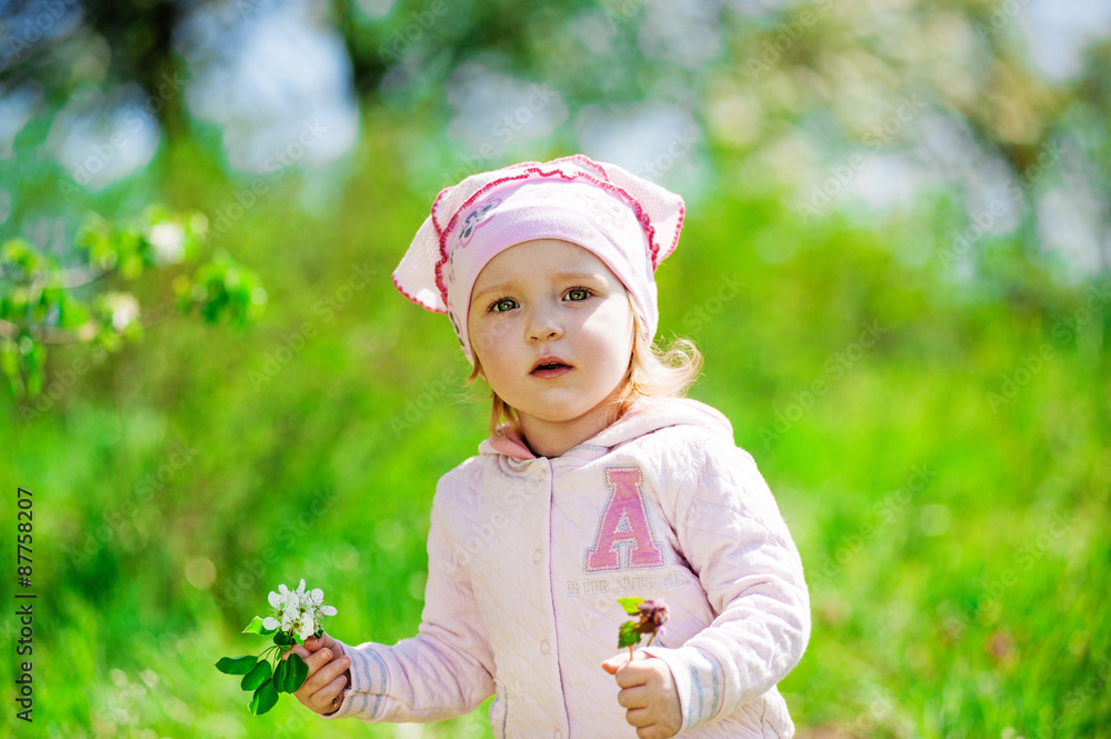 Adorable little girl with flowers Adorable little girl with flowers