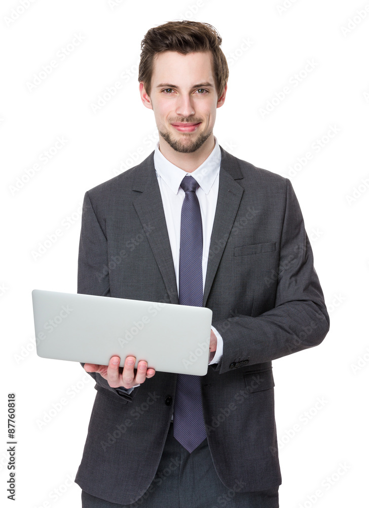Young Businessman use of the notebook computer Young Businessman use of the notebook computer