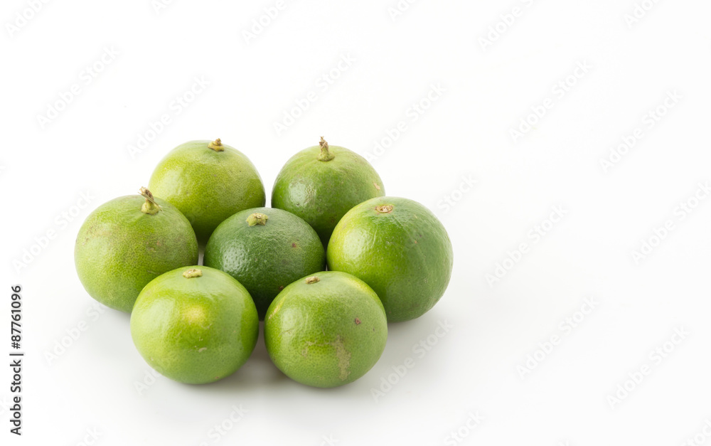 green lemon isolated on white background green lemon isolated on white background