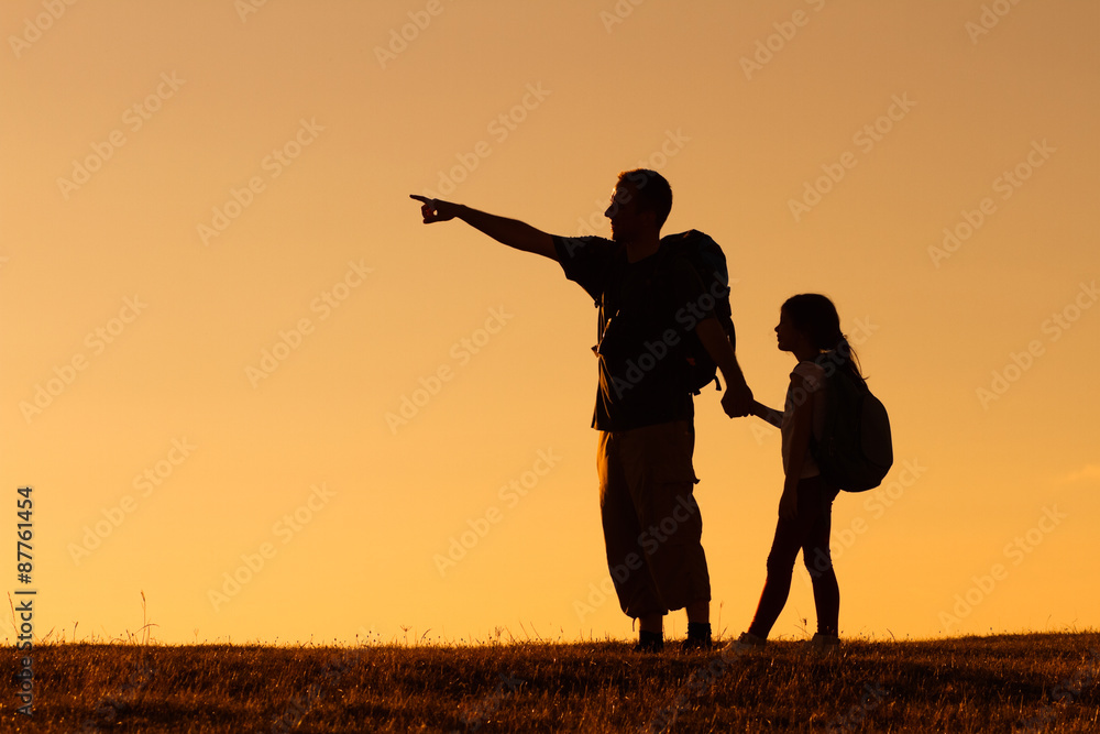 Father and daughter hiking