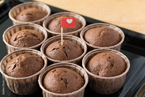 Chocolate muffins with small flag of love