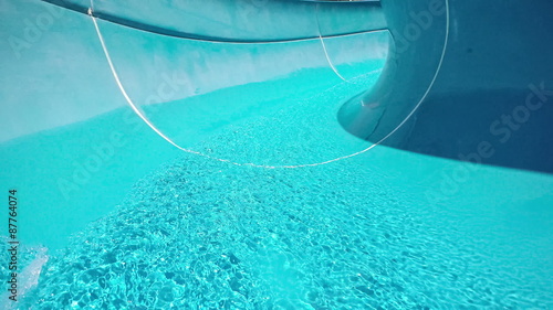 First-person view, the descent from the waterslide on holiday aqua park