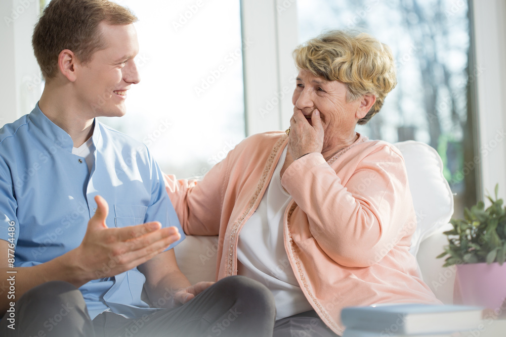Fototapeta premium Man and elderly woman laughing