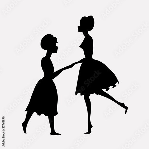 Silhouettes of dancing mother and daughter
