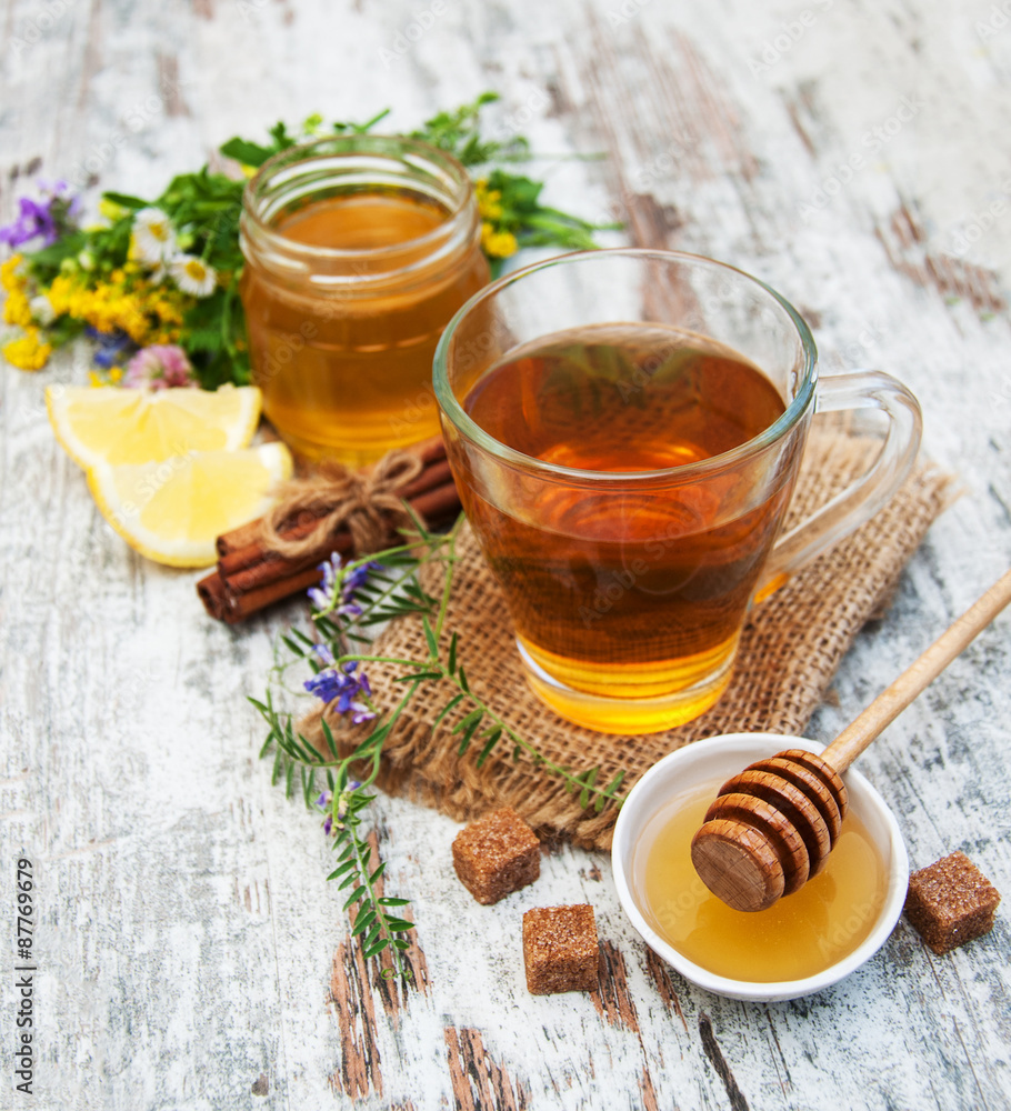 Cup of tea, honey and flowers Cup of tea, honey and flowers